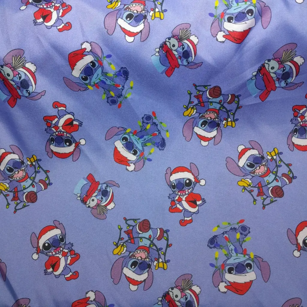 Tropical mecanico Navideño Stitch Lila2